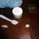 Filling the holes with a flexible compound supplied with the leather repair kit.
