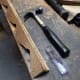 Gluing and tacking the decorative trim to the beading that will be acting as a spacer to fill the gap between the top of the pigeon-holes and the top of the bureau.
