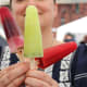 Flavored liquid containing artificial coloring (frozen around a stick) can color your stool.