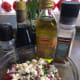 Pour blended olive oil and vinegar over tomatoes, mix gently, refrigerate for about an hour and enjoy!