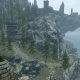 View from Katla's Farm, the stables of Solitude, which players should travel from, taking the right path seen in this image to reach the lighthouse.