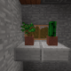 Place slabs under the window to make a windowsill - then, add some plants!