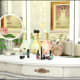 Your female Sim definitely needs this dainty set: makeup, perfume, and a vanity mirror.