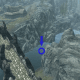 The approximate location of the chest, underneath the water of the river that runs past Dragon Bridge.