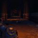 Turning around and heading indoors, through this large corridor, the skull sitting at the far end.