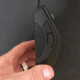 In the 2013 Razer switched to the non-slip side buttons. This is an upgrade that, for me, is worth its weight in gold.
