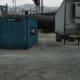 Third Armor set at the other end of the Survival area, next to the green container at the north end. Just avoid this one unless you're in co-op.