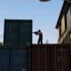 This upper green container makes a good spot to provide over-watch. You need to rely on other players to watch your back.