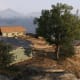 The view from the overlook. Toss a Grenade by the house, that is where a Patriot is parked.