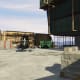 You can land the Buzzard on the lower roof, this will save you a climb to the roof.