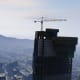 Approach the construction site from this direction. How you fly to it is up to you, but if you want to machine gun the guys by the briefcase I found this a good approach.
