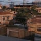 Run to this house (behind the tree) after you blow up the first gang vehicle.