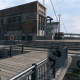 The maintenance warehouse/boathouse at the Marina where some missions take place. Of course conveniently peppered with CCTV cameras that can be hacked.