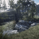At this bridge, on the right near a wrecked cabin, is a Lock Box containing the Dynamite Arrow Pamphlet.