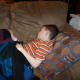 At home on the couch, three hours after surgery was performed.