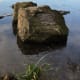 This rock stands a few feet from the water's edge and is within sight of the visitor centre. The plaque commemorates the official opening of Westport Lake by Ted Heath in 1971