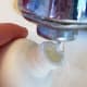 Pour soap into your spritz bottle and fill with water.