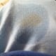 I used my sanitizer to moisten the stain. Who knows if it'll come out when I wash this shirt, but it's worth a try to keep it from setting.