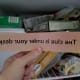 Wear gloves, cold clue—it has to be in the freezer. Sure enough! But how am I supposed to read this?!