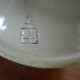 Close up of or pottery mark. Looks a bit like a Japanese pottery mark.