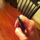 Step One: Bend the pushrod tip to 90 degrees using a pair of pliers.