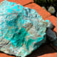 Fake turquoise is not valuable, but it's pretty! Found near a small abandoned turquoise mine near Yuma, Arizona.
