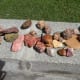 Rocks collected near various campsites in the southwest decorate a wall.