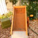 This is a top view of the hopper. Notice the screening which classifies the material. Also, notice the chute at the bottom where the rocks are guided off.
