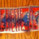 A clear, plastic set of playing cards laid out.