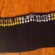 A black set of playing cards laid out