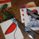 Before you start, assemble everything that you need: postcards, ruler, pencil, craft knife . . .