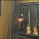 Picture of wine, or rifles, and a lantern on wall