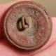The back side of the same button.