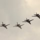 A flight of F-111s over Washington DC, June 1991. It was part of the Desert Storm Victory Parade. The 2 aircraft on the right are F-111s and the 2 on the left are EF-111s.