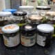 After a month in the sunshine the oil in jars is ready for straining, to separate the essential eucalyptus oil from the leaves.