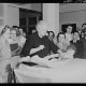 Minneapolis MN: young Marvin Goldstein, an infantile paralysis patient, shows control of extensor muscles of the back at a class for technicians and doctors conducted by Sister Kenny, who successfully treated polio.