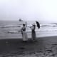 1916—dresses on the beach.