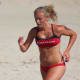 Fun and functional, this lifeguard wears a suit that fits, flatters and lets her do her job. Don't forget the sunscreen!