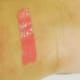 Swatch on my arm of the shade: Attraction (Nude Coral).