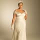 Evelin pleated gown. A jaw-dropping, statuesque wedding dress with columns of pleats, exuding purity and elegance in luxurious stretch satin and peeking open neckline.