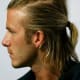 Double-ponytail on a man.