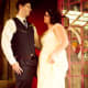 Taking photos after the ceremony in this lovely phone booth.