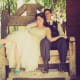 Taking a load off on a giant wooden bench, with Mr. Heather Says.