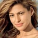 Eva Mendes with golden, sandy blonde hair.