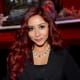 Snooki with mahogany hair and olive skin tone.