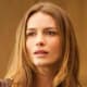 A touch of sand and a touch of gold for Saffron Burrows.