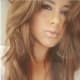 Subtle blonde highlights on brown hair.
