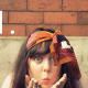 A scarf makes a lovely headband.