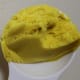 Measure the beeswax, shea butter, and cocoa butter and place them in the smaller pot or container.