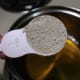 Remove pot from heat and add the clay.